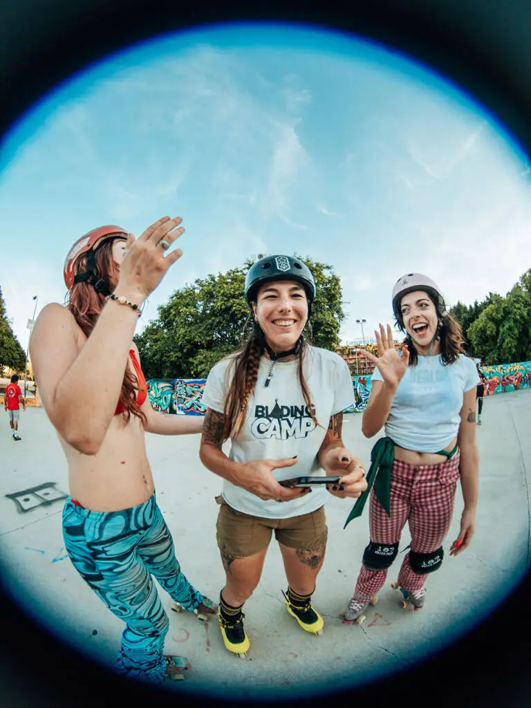 Two skaters laughing at the skatepark