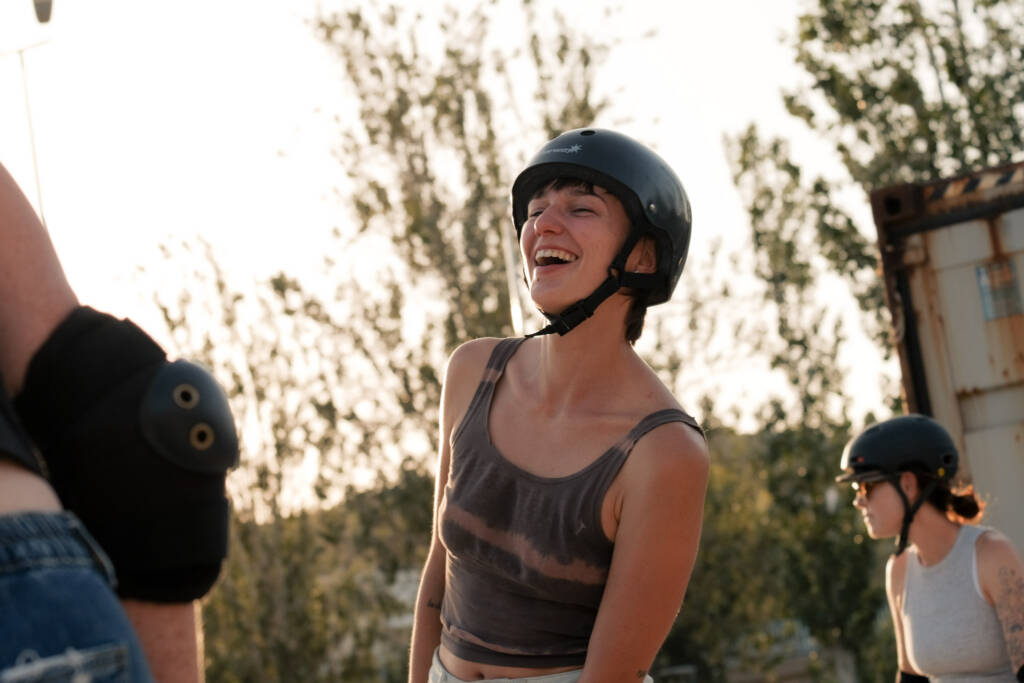 Skater laughing in the golden evening light